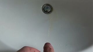 Boy is Pissing in the Sink and makes stinky farts