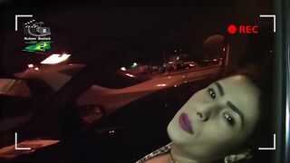 Sexy busty makes blowjob in the car on the street.