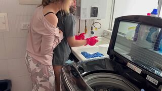 Two lesbians having silent sex in the kitchen.